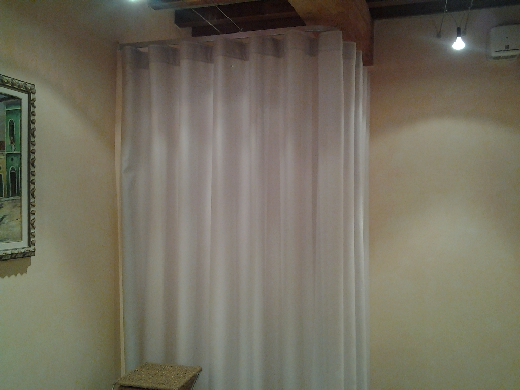 Tenda da interno su trave